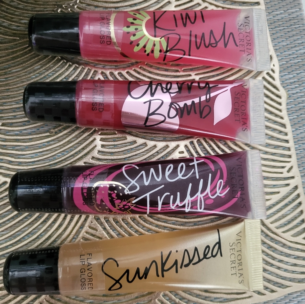 Victoria's secret lip gloss set new sealed